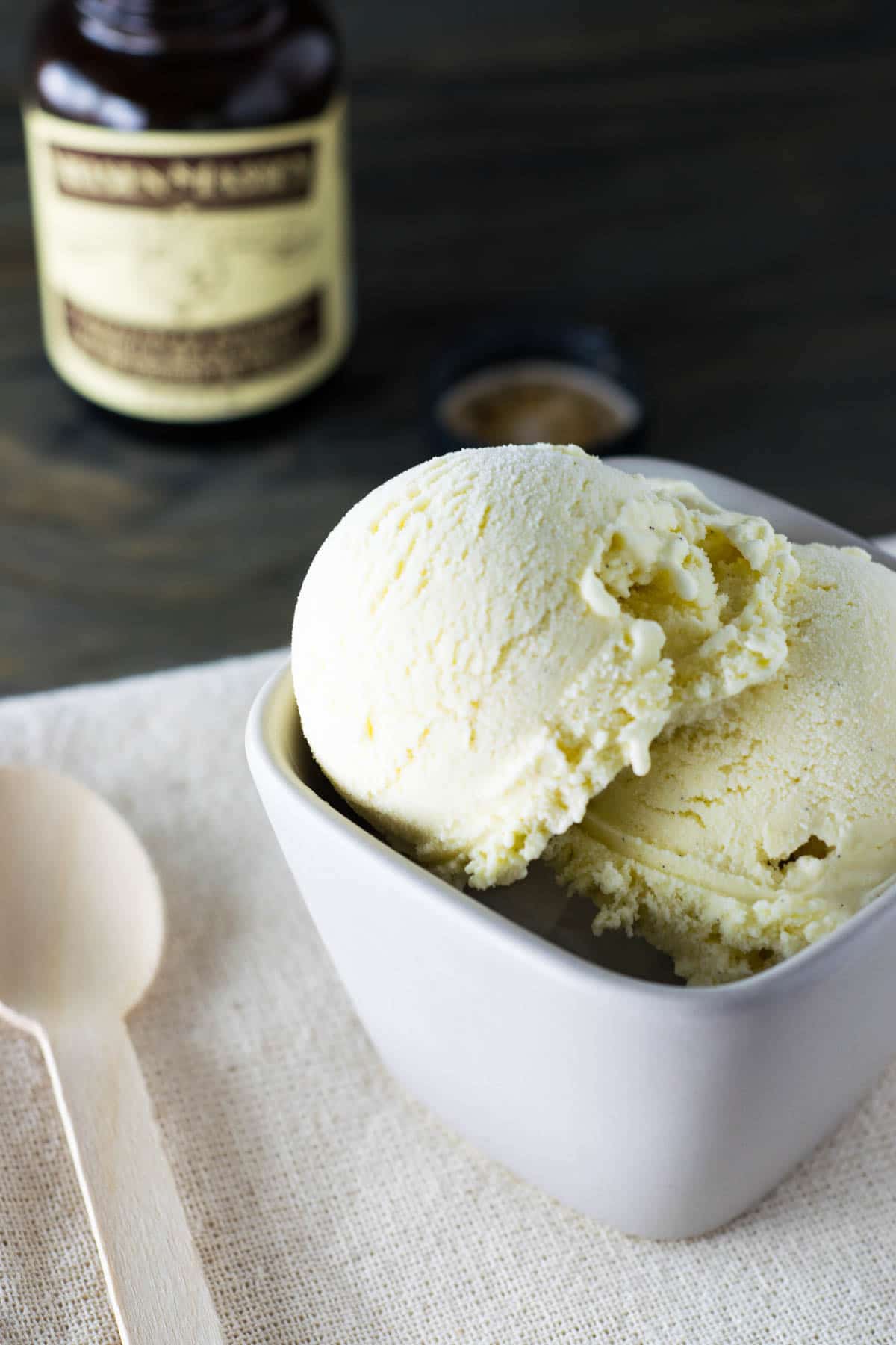 homemade vanilla ice cream with vanilla paste on the background