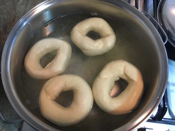 Homemade Bagels being boiled